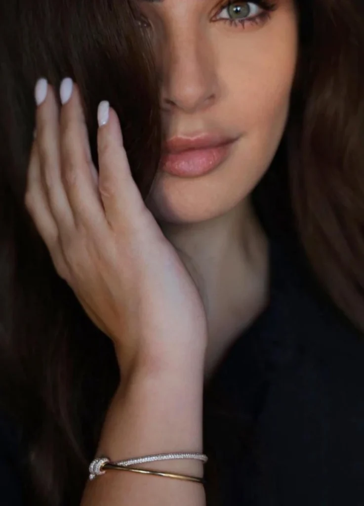 
Tiffany Knot Double Double Row Hinged Bangle 
in Yellow Gold with Diamonds

$32,500