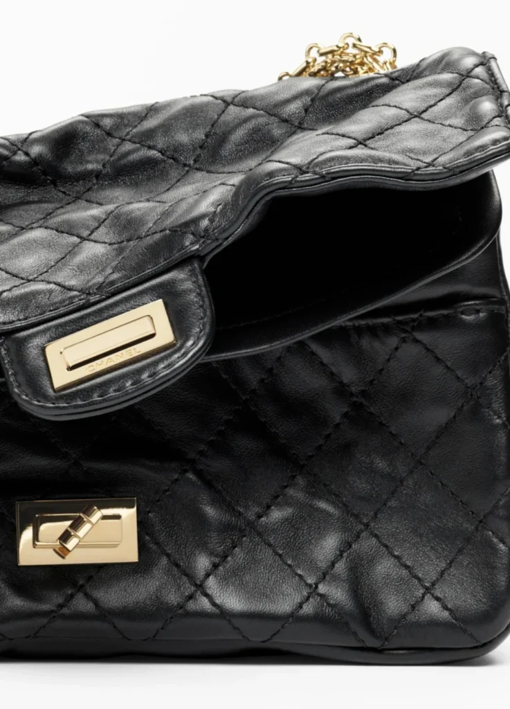 Chanel 2.55 Handbag
Lambskin & Gold-Tone Metal, Black