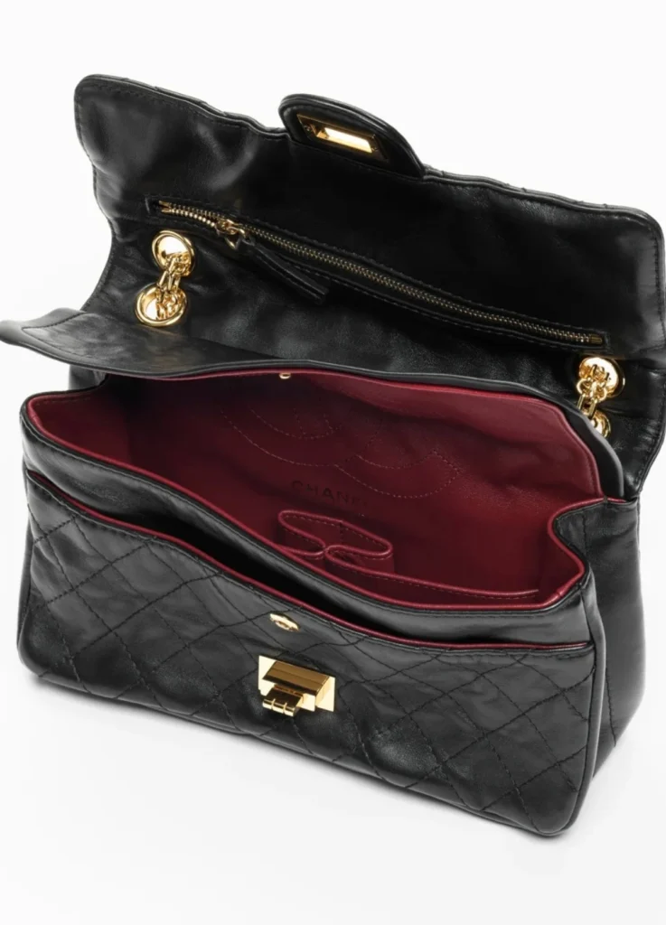 Chanel 2.55 Handbag
Lambskin & Gold-Tone Metal, Black