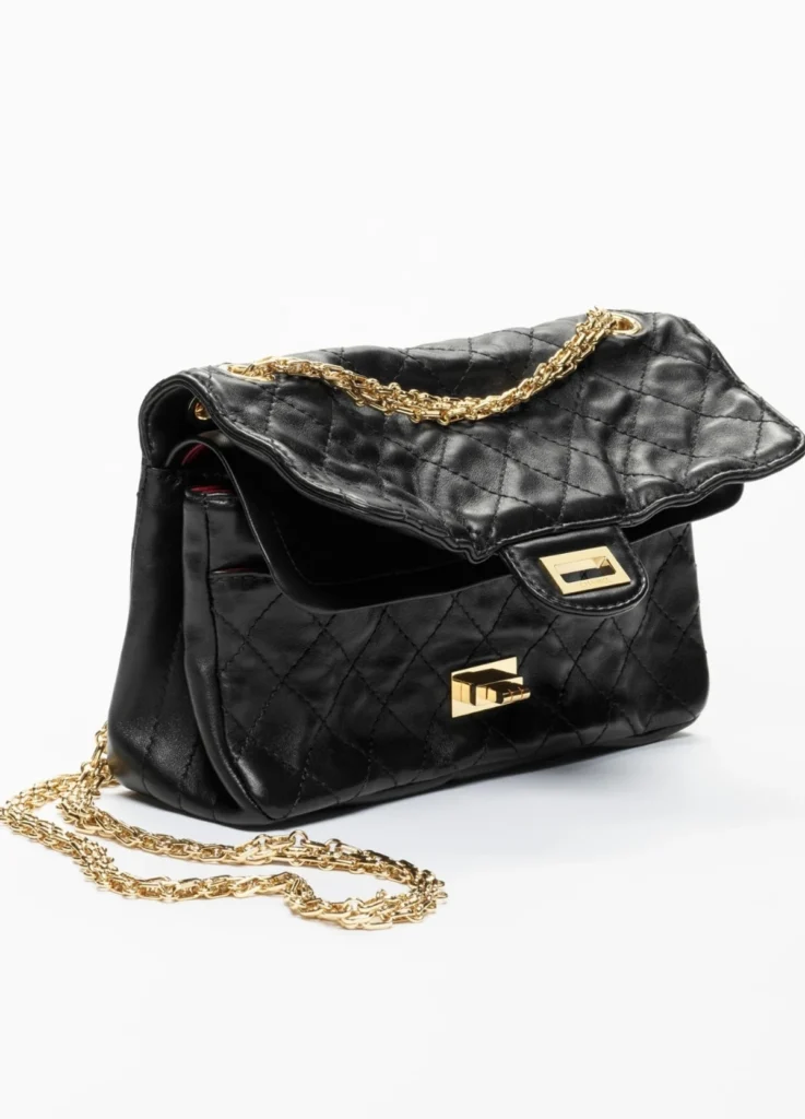 Chanel 2.55 Handbag
Lambskin & Gold-Tone Metal, Black