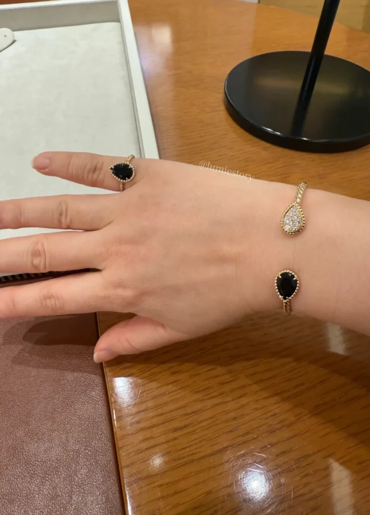 Boucheron Serpent Bohème Ring S motif, Onyx ($2,460 Excl. Tax)
Serpent Bohème Bracelet Double S motif ($8,850 Excl. Tax)