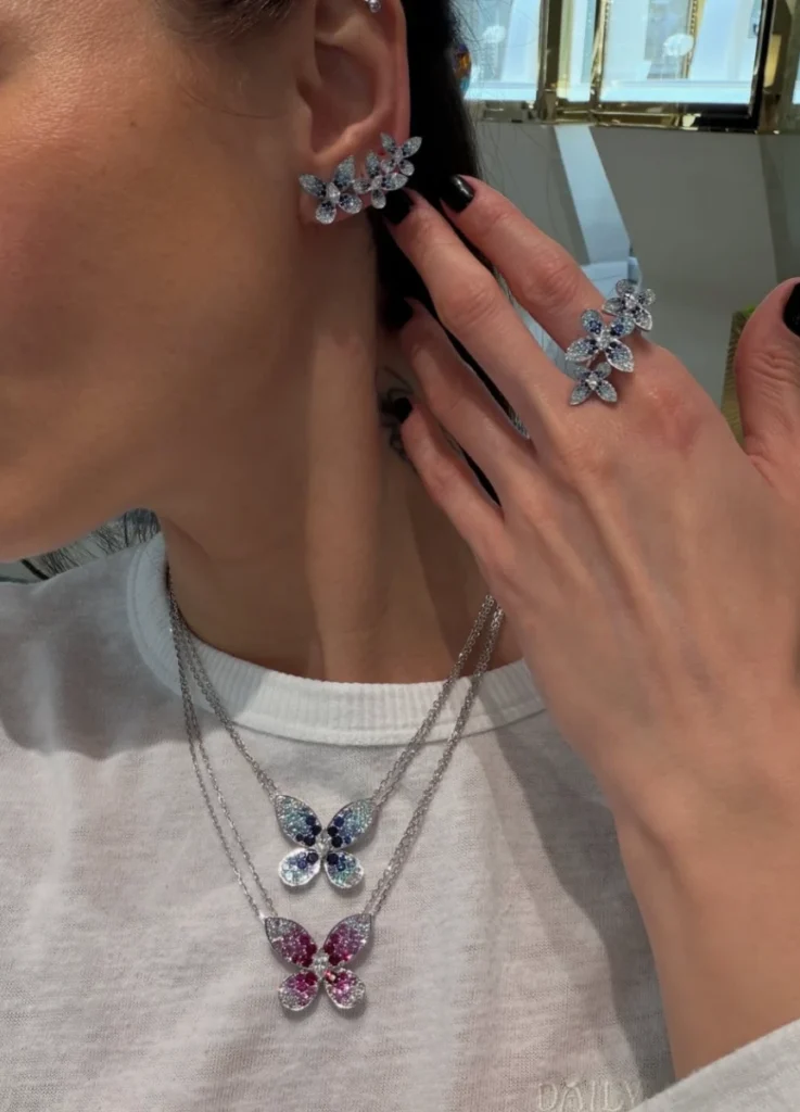 Graff Butterfly necklace on the body — collarbone and neckline detail