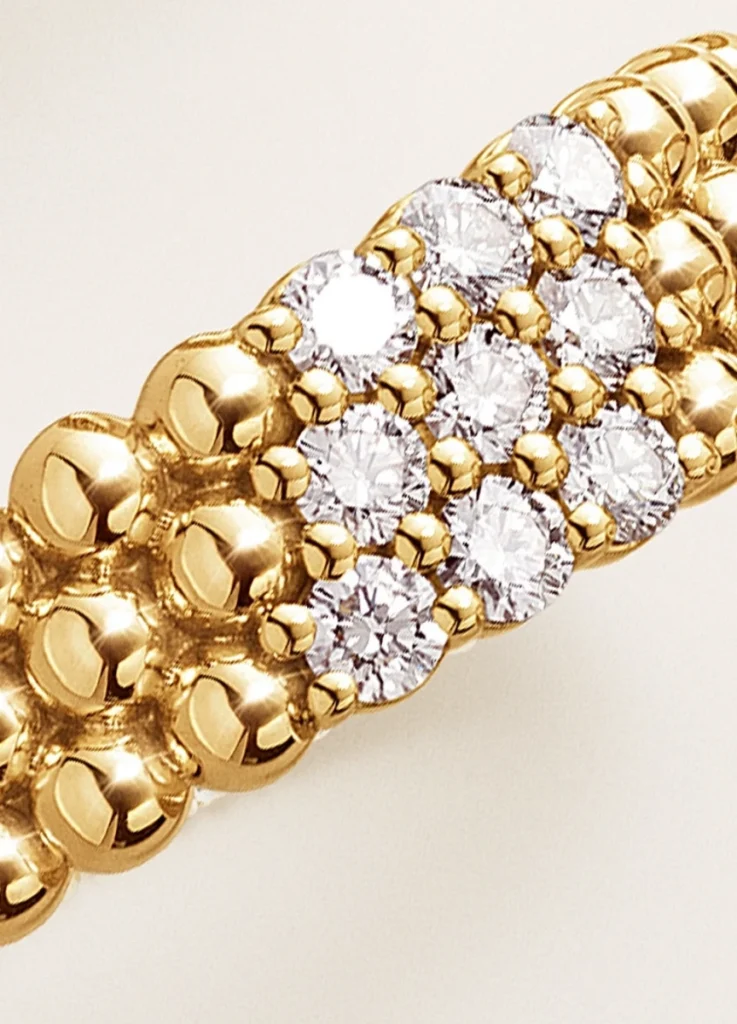 Perlée three-row ring