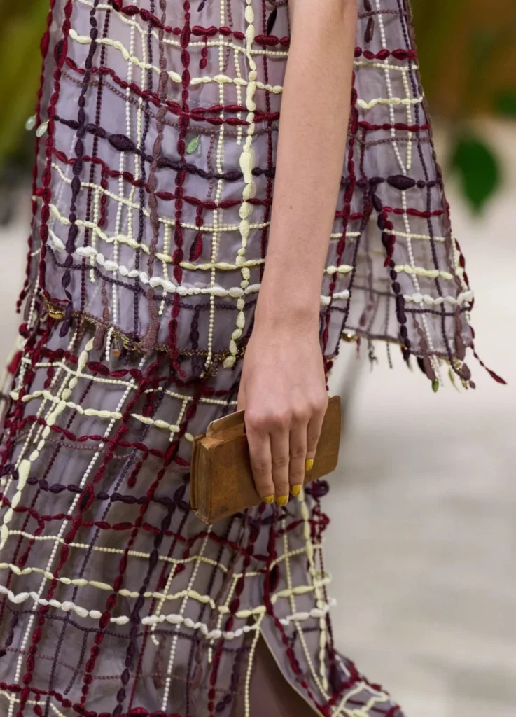 Opening look — the model carrying the storybook