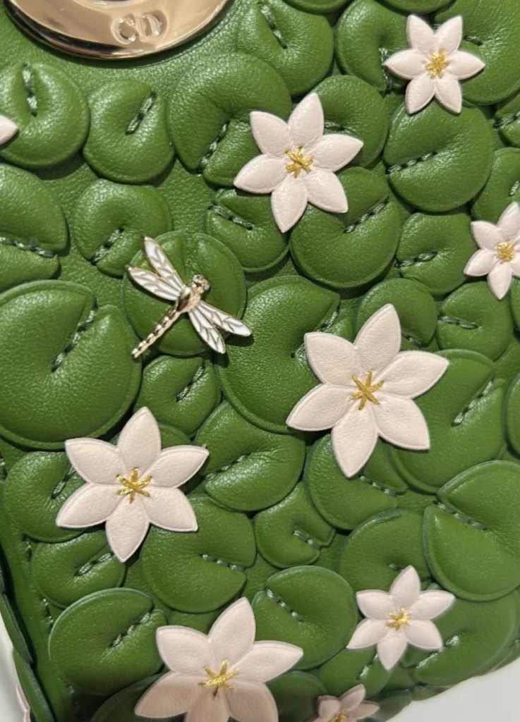 Green Lady Dior with lily pad appliqué, at the boutique