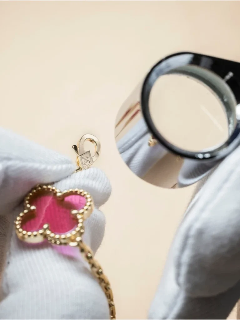 close-up of the pink enamel motif