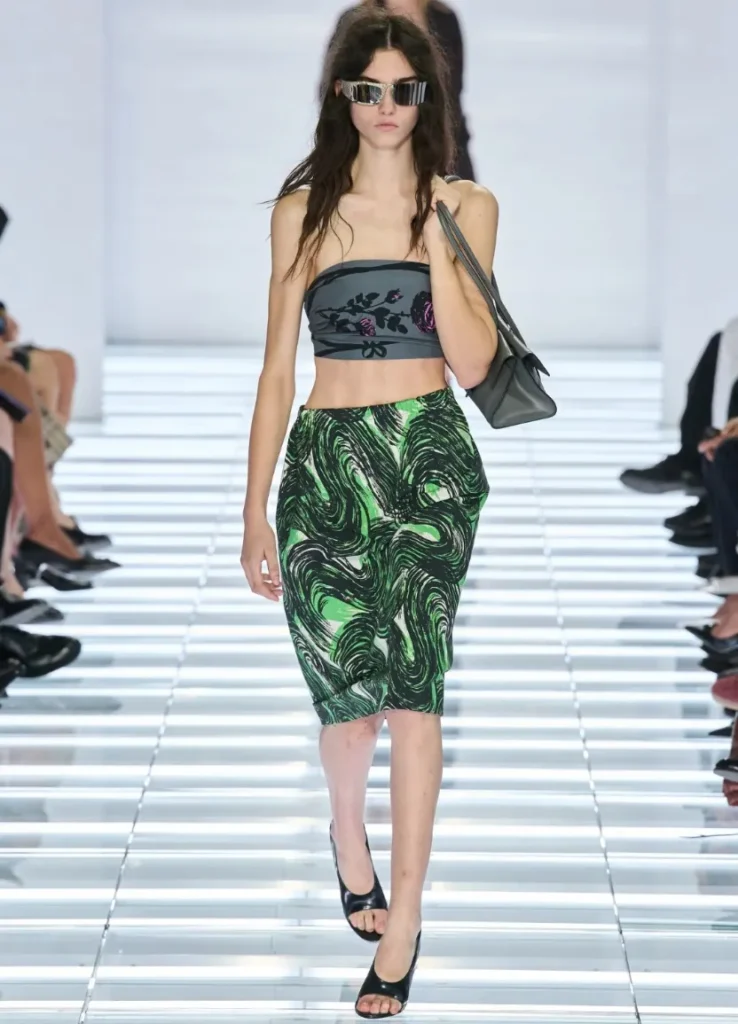 Prada Spring 2027 Look 32 
— green swirl print pencil skirt with patterned bandeau
