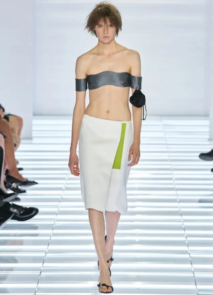 Prada Spring 2027 Look 63
 — white skirt with lime vertical panel